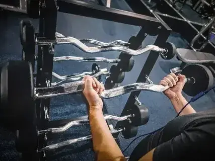 Strength training rack with weight plates